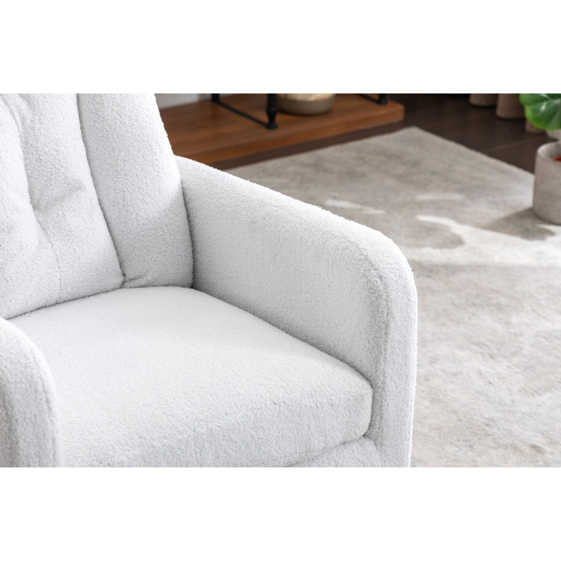 022-Fauteuil basculant pivotant en tissu de lin, modèle Gilder, avec poche.