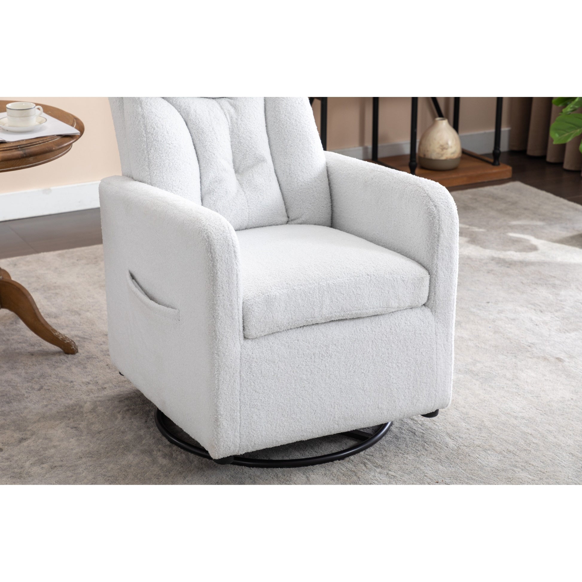 022-Fauteuil basculant pivotant en tissu de lin, modèle Gilder, avec poche.