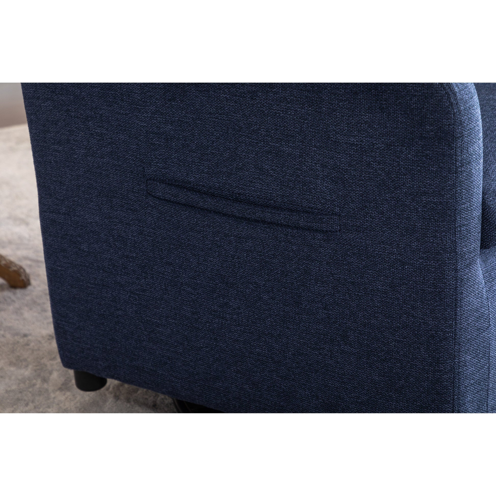 022-Fauteuil basculant pivotant en tissu de lin, modèle Gilder, avec poche.