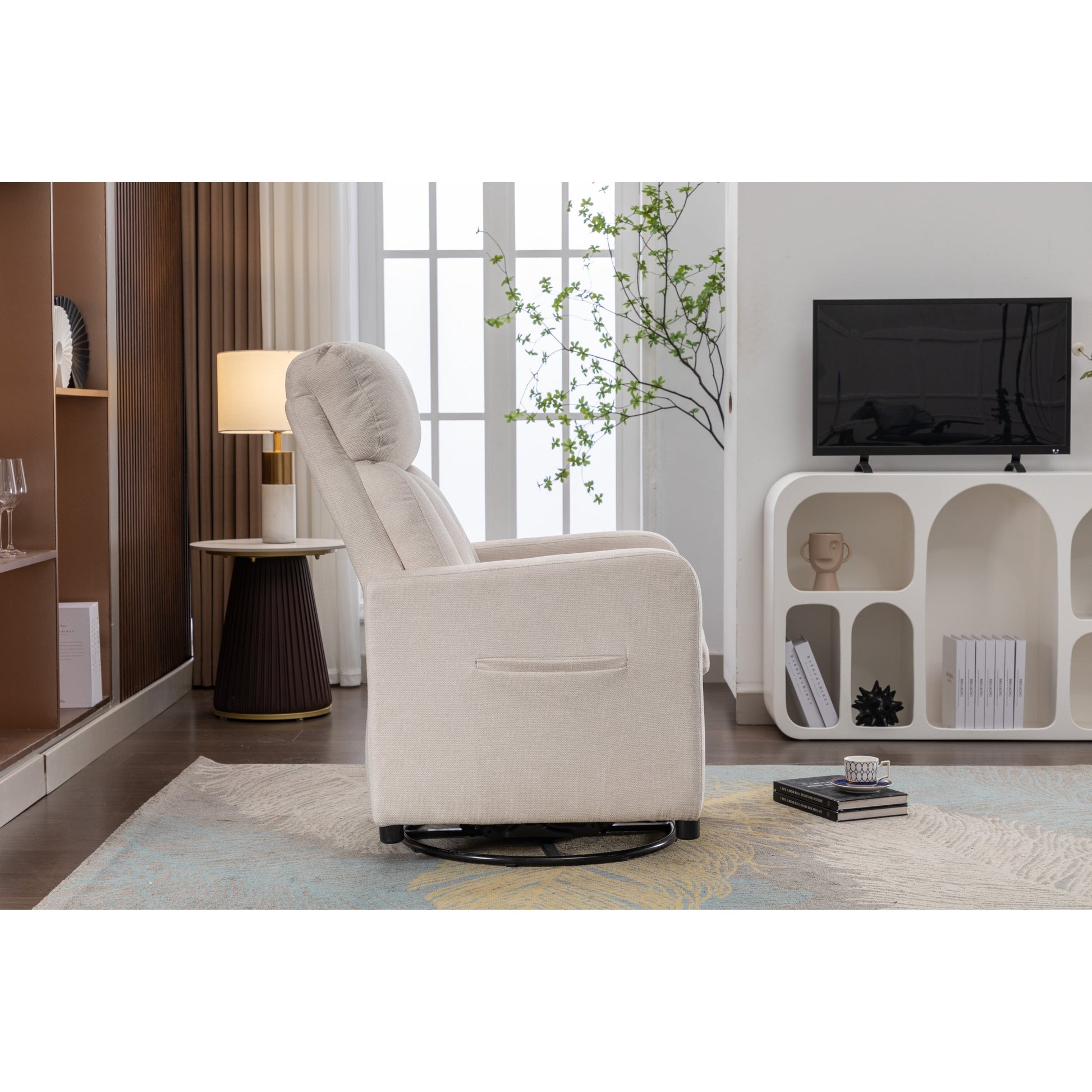 022-Fauteuil basculant pivotant en tissu de lin, modèle Gilder, avec poche.