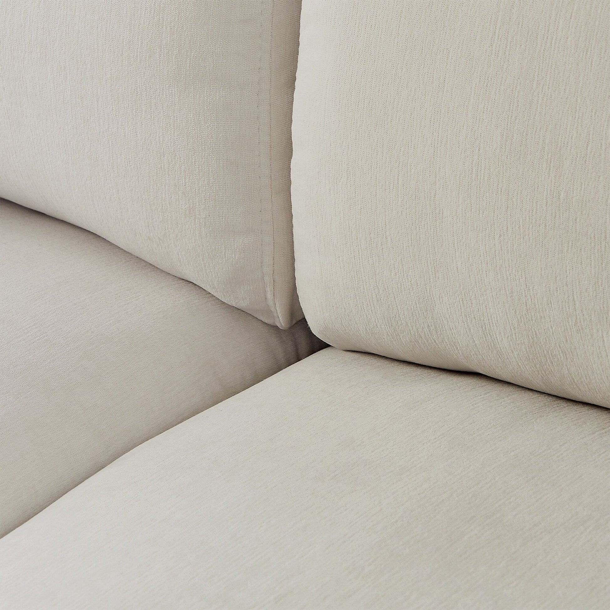 Canapé d'angle en forme de L 102.4 en polyester avec pouf réversible, coussins épais et pieds en plastique durables.