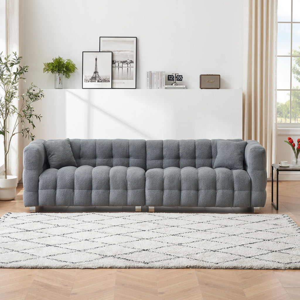 Canapé 4 places en velours Teddy de 259 cm avec pieds en métal et coussins décoratifs, design moderne multidirectionnel pour salon.