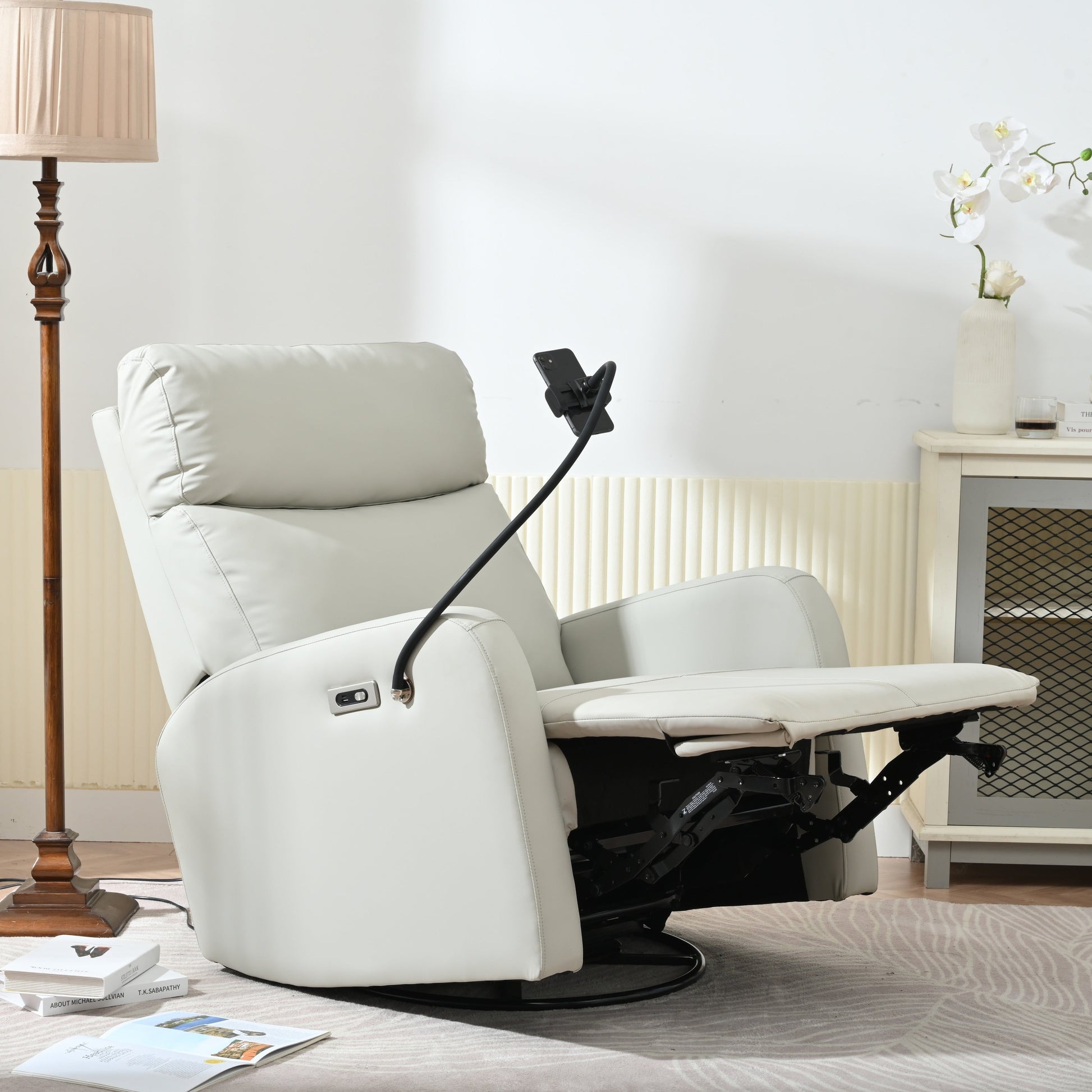 Fauteuil inclinable pivotant à 270° avec ports USB, dossier électrique et confort moelleux pour une relaxation ultime.