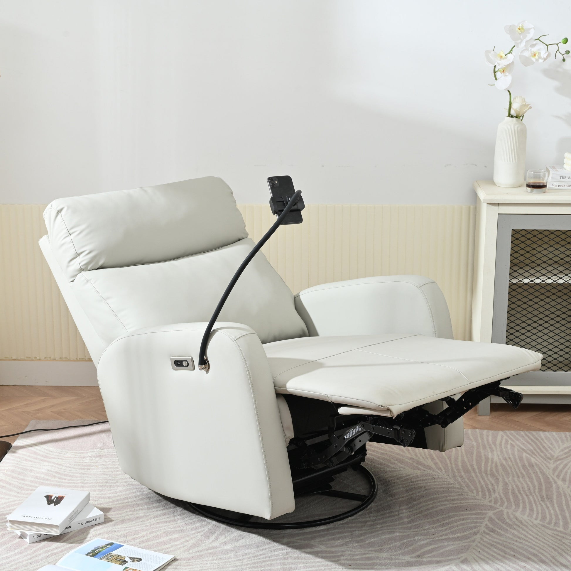 Fauteuil inclinable pivotant à 270° avec ports USB, dossier électrique et confort moelleux pour une relaxation ultime.