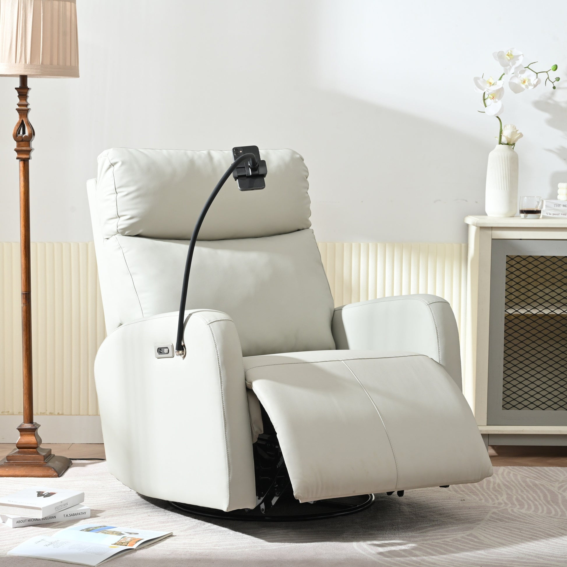 Fauteuil inclinable pivotant à 270° avec ports USB, dossier électrique et confort moelleux pour une relaxation ultime.