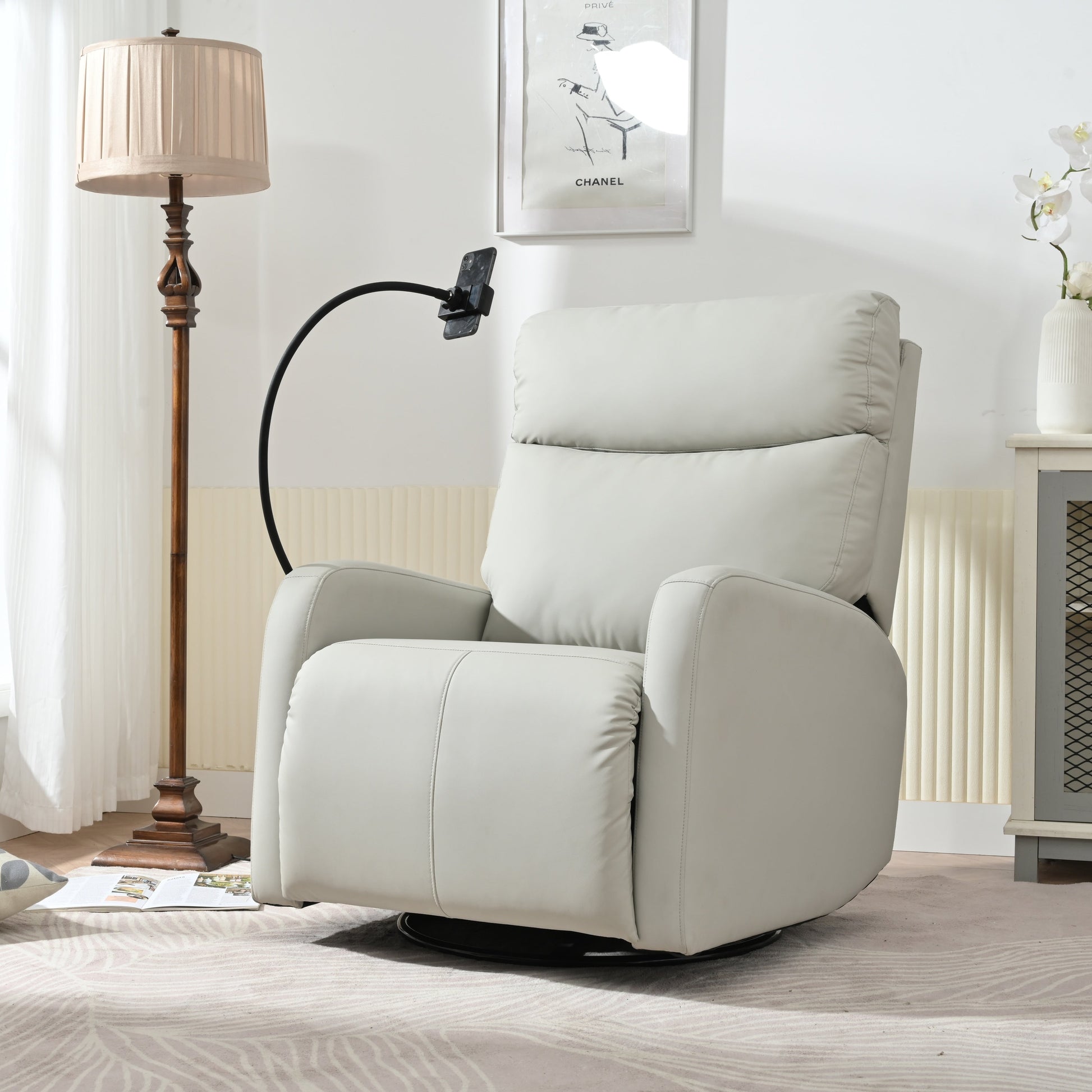 Fauteuil inclinable pivotant à 360° avec repose-pieds, porte-téléphone et positions réglables pour salle de cinéma et salon.