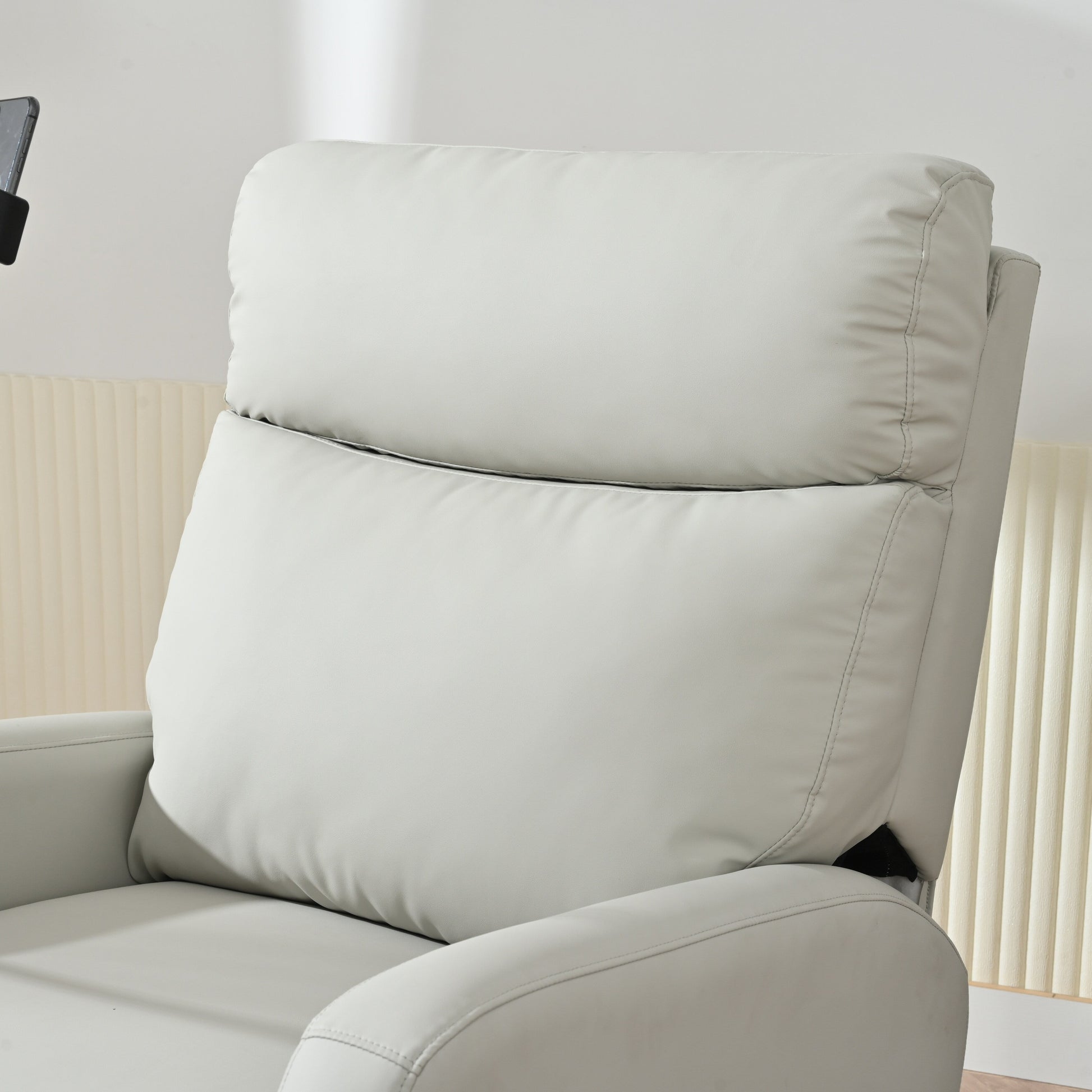 Fauteuil inclinable pivotant à 360° avec repose-pieds, porte-téléphone et positions réglables pour salle de cinéma et salon.