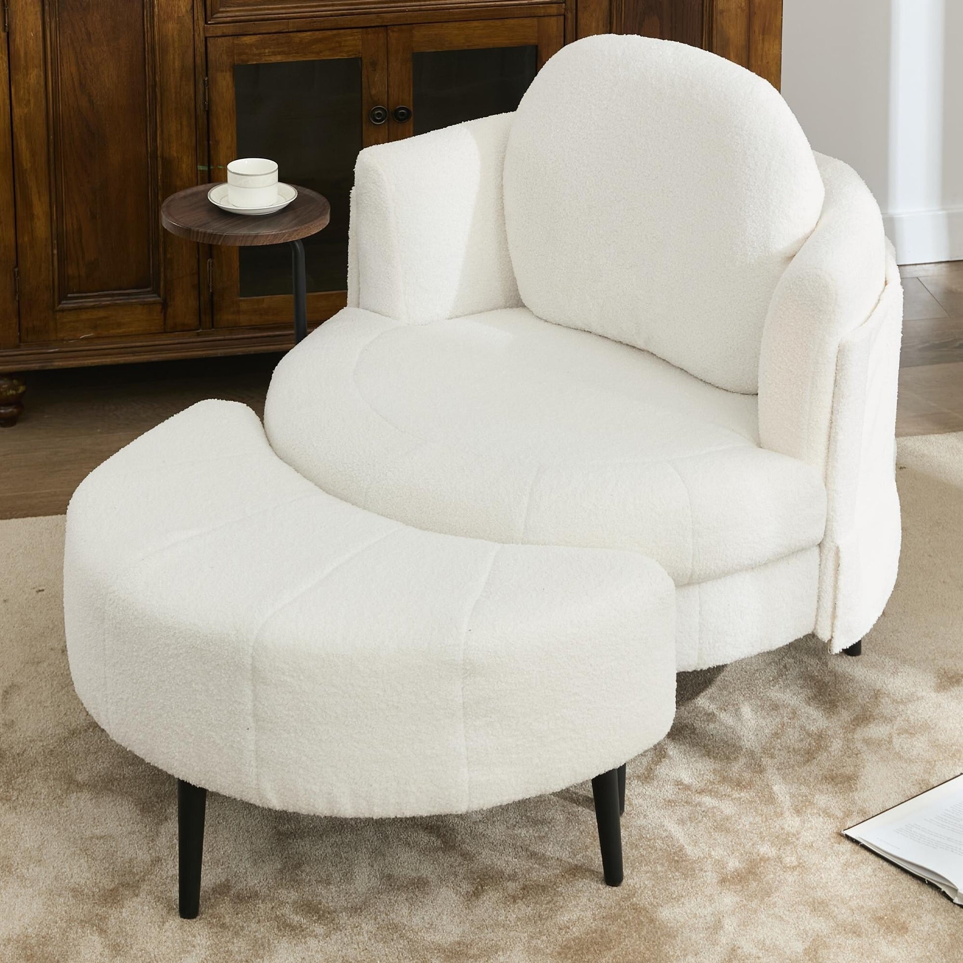 Fauteuil 42.5 avec repose-pieds mobile en forme de croissant