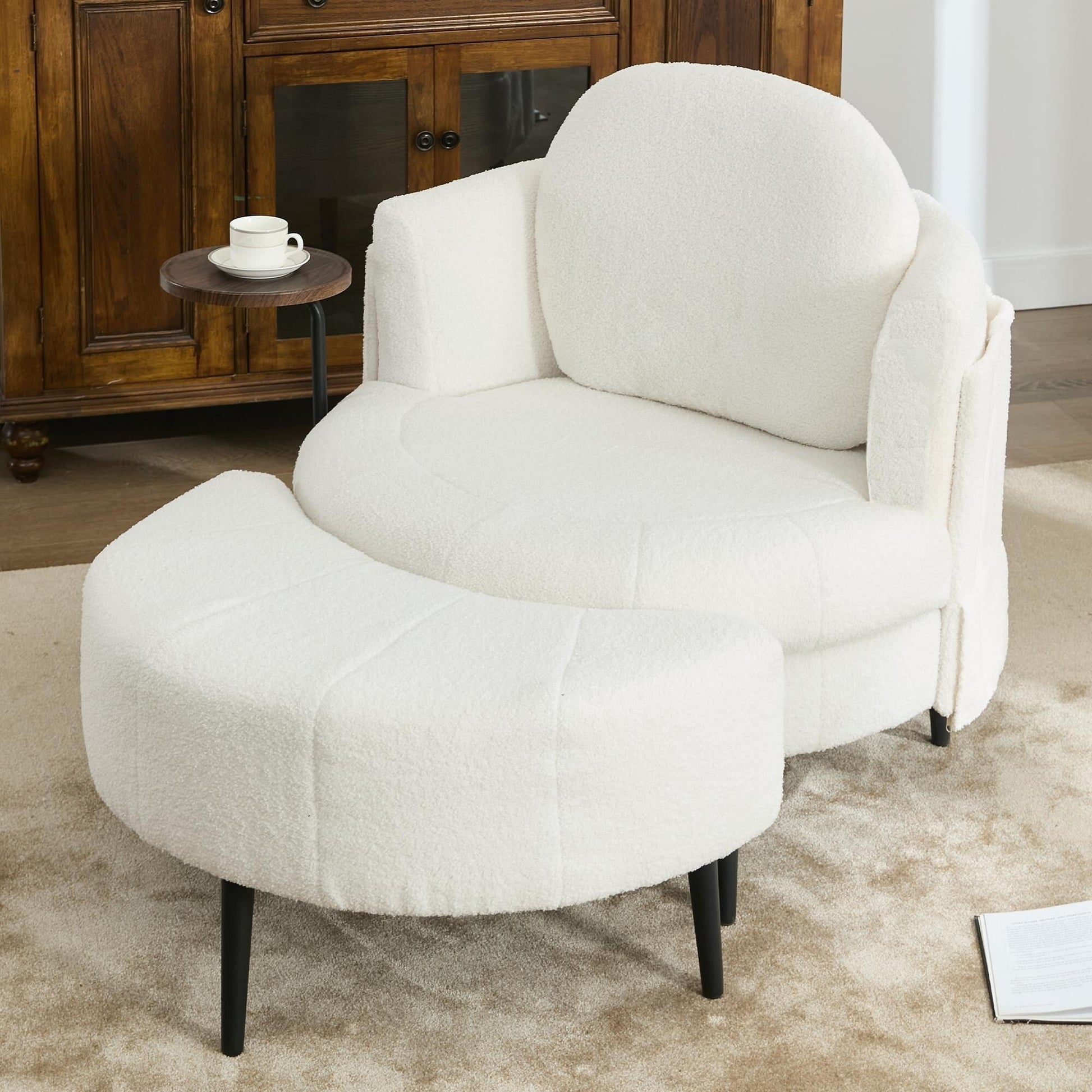 Fauteuil 42.5 avec repose-pieds mobile en forme de croissant