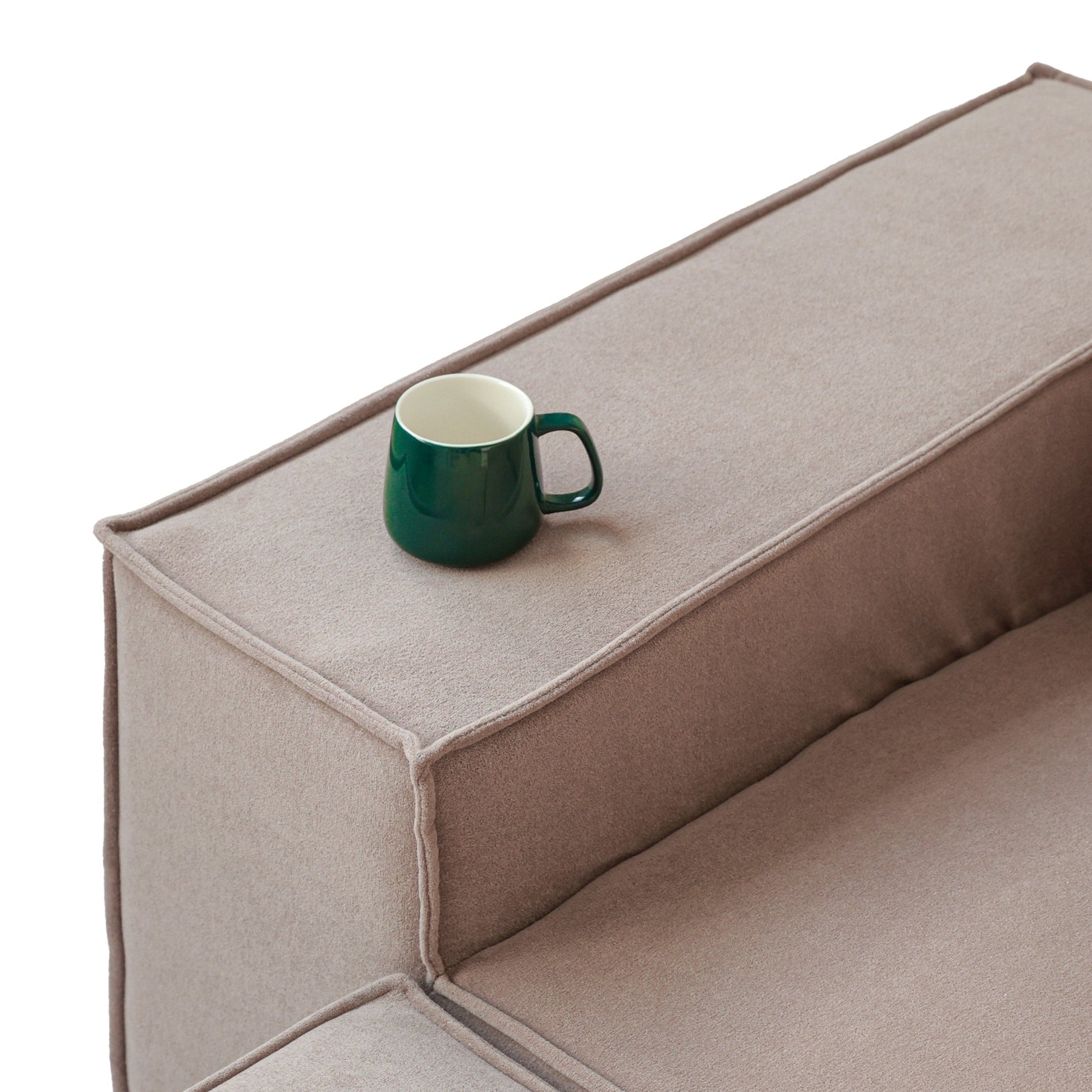Canapé d'angle modulable en cordouroy pour 5 personnes avec plusieurs coussins